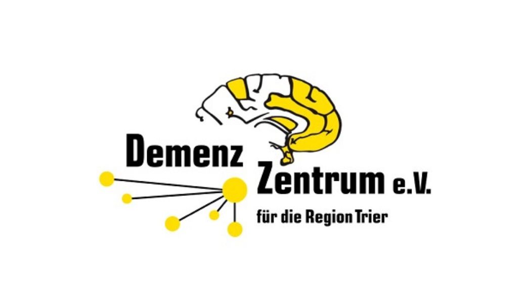 Logo mit der Aufschrift ‚Demenz Zentrum e. V. für die Region Trier‘, ergänzt durch eine stilisierte Gehirnzeichnung in Grau und Gelb sowie gelbe, durch Linien verbundene Punkte als Symbol für Vernetzung